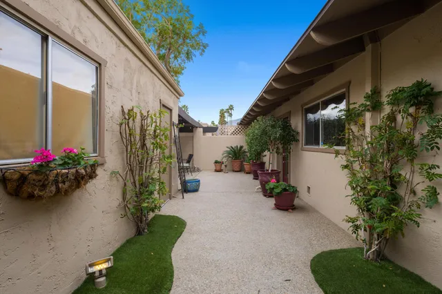 a view of a porch with furniture