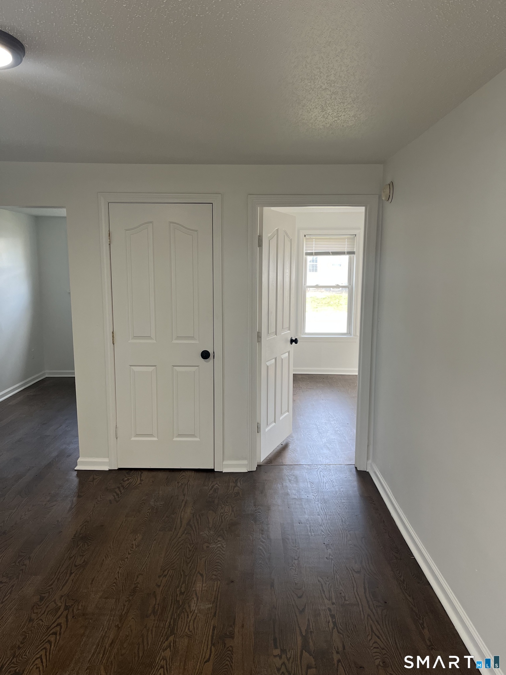 52 Pearl Street Manchester, CT 06040 - Photo 21 of 31 a view of wooden floor and windows in a room