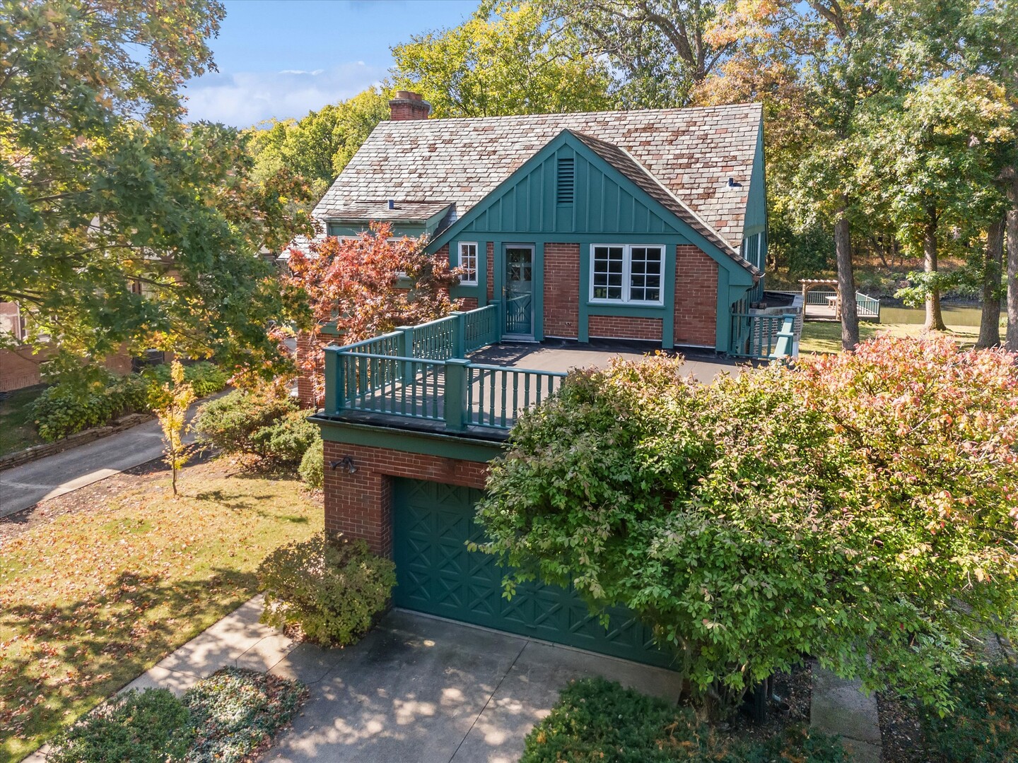 220 Maplewood Road Riverside, IL 60546 - Photo 7 of 11 a view of a house with a yard wooden fence and trees