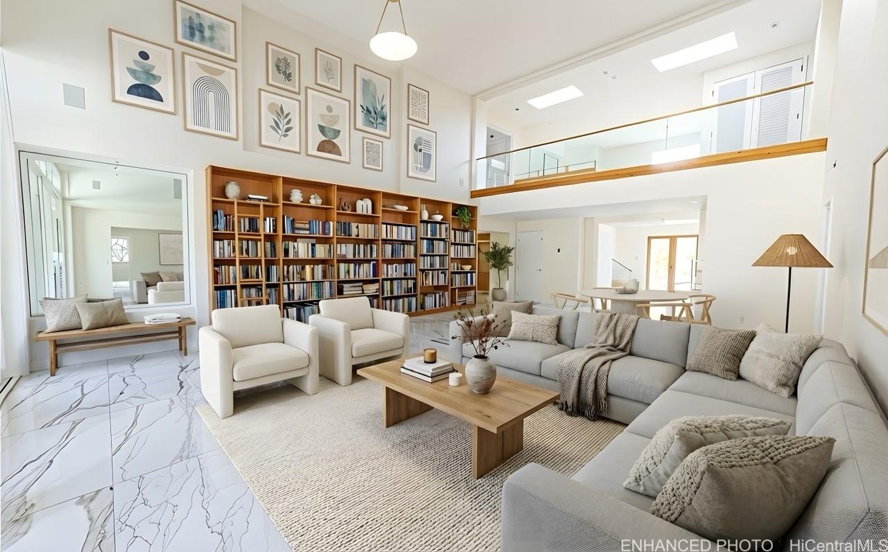 235 Portlock Road Honolulu, HI 96825 - Photo 5 of 21 a living room with furniture fireplace and a large window