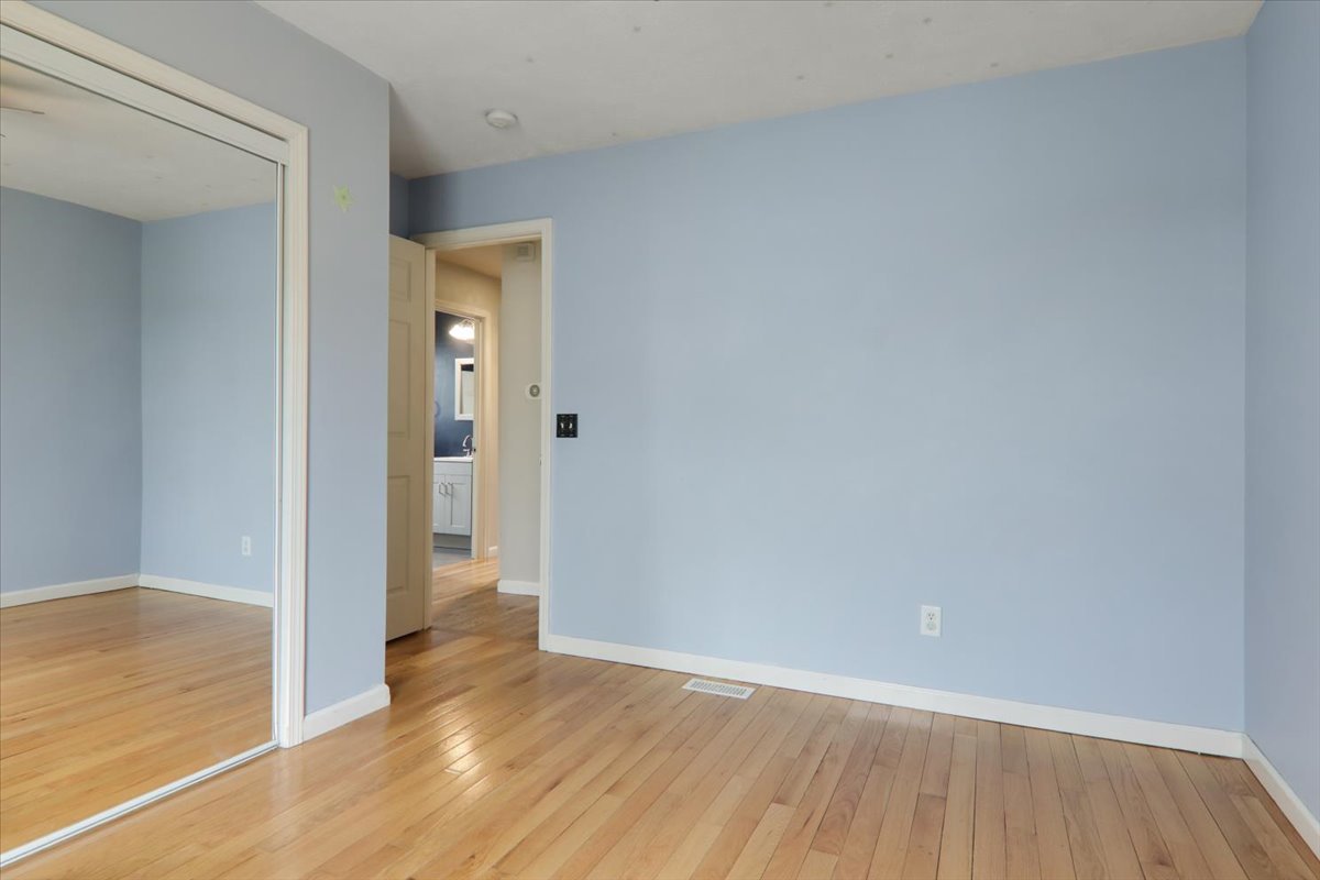 1401 River Landing Street Normal, IL 61761 - Photo 15 of 27 a view of an empty room with wooden floor