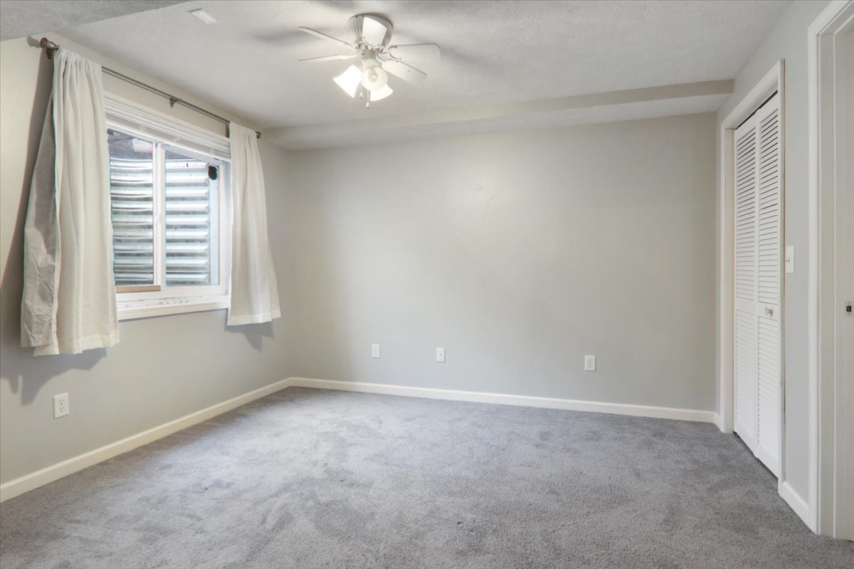 1401 River Landing Street Normal, IL 61761 - Photo 18 of 27 wooden floor in an empty room with a window