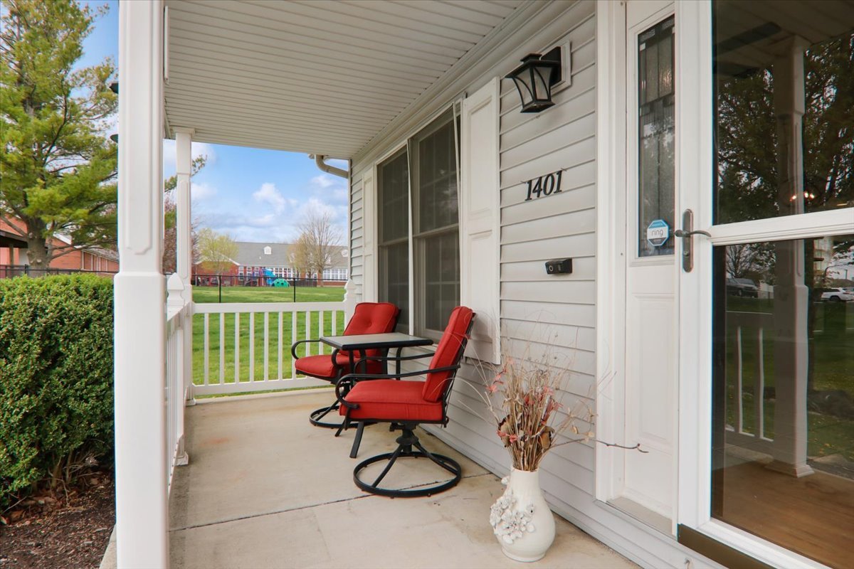 1401 River Landing Street Normal, IL 61761 - Photo 2 of 27 a house view with a seating space and garden space