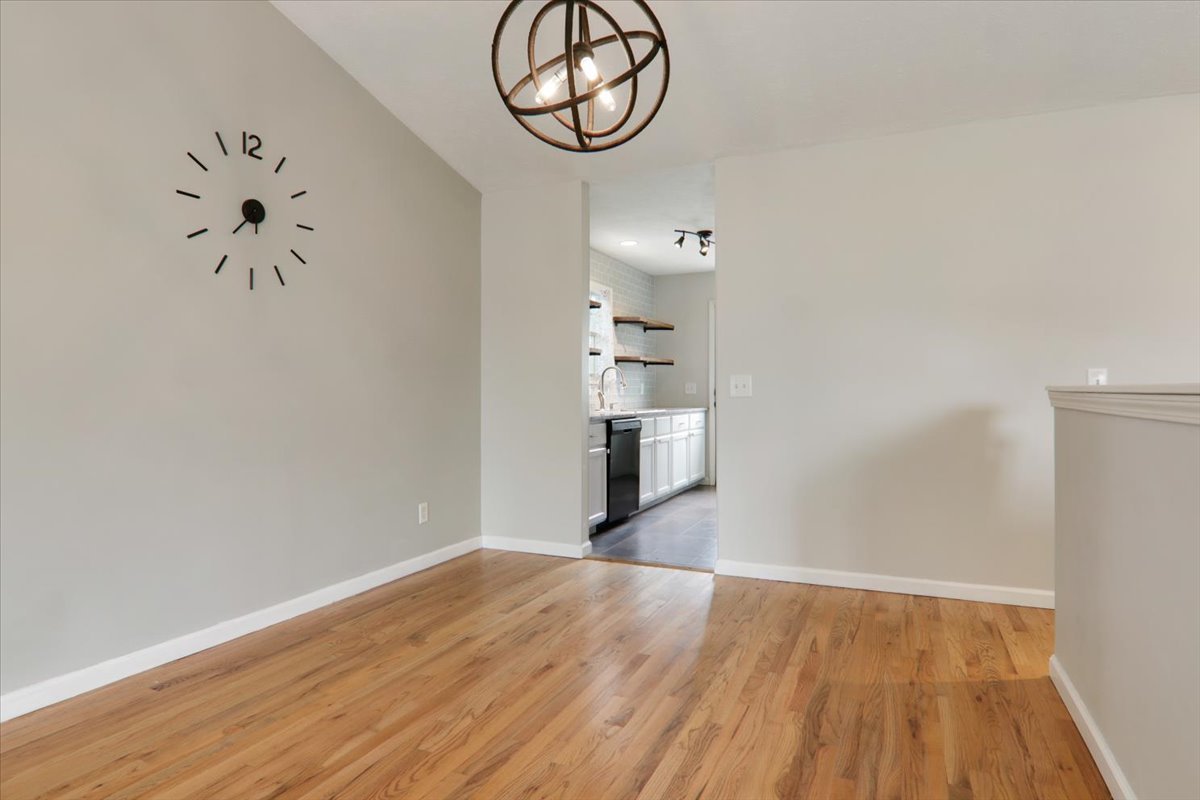 1401 River Landing Street Normal, IL 61761 - Photo 5 of 27 a view of a room with wooden floor and white walls