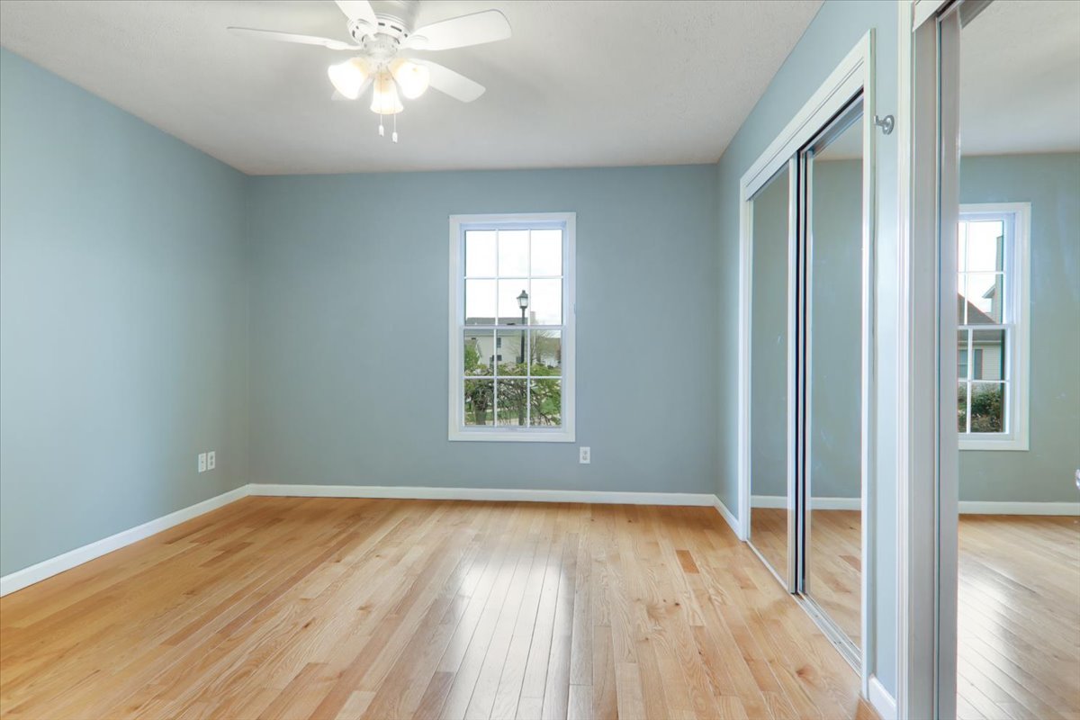 1401 River Landing Street Normal, IL 61761 - Photo 8 of 27 wooden floor in an empty room with a window