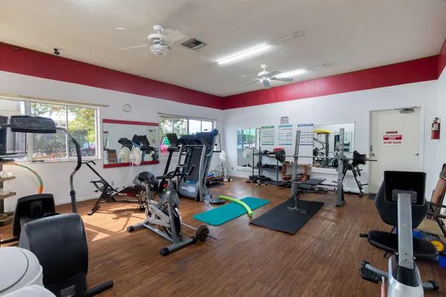 a view of a room with gym equipment