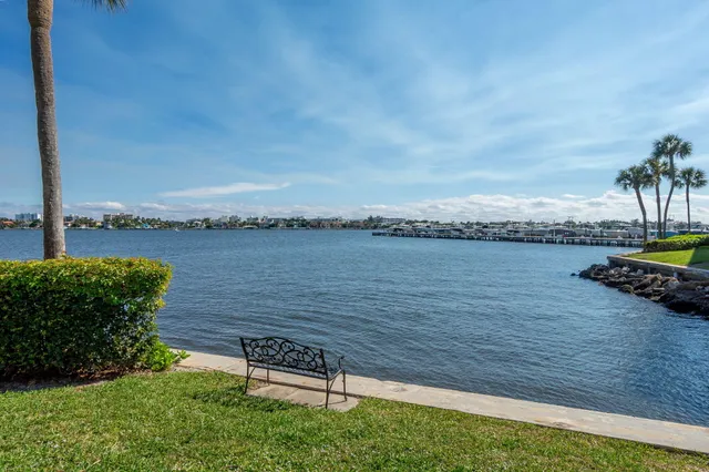 a view of a lake with a big yard