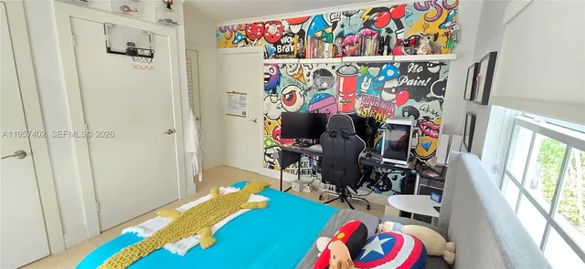 a bed room with a bed and a couch