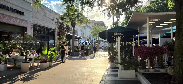 a view of street with sitting area