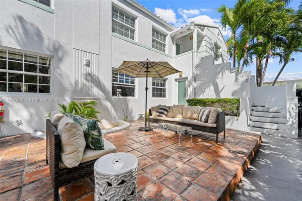 a picture of a building with a tree