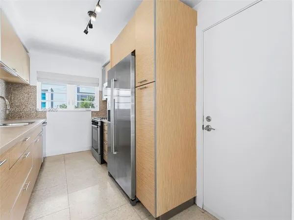 a view of a room with a hallway