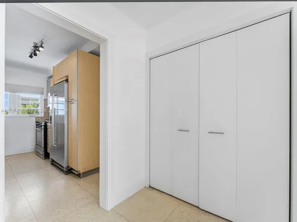 a view of walk in closet with window