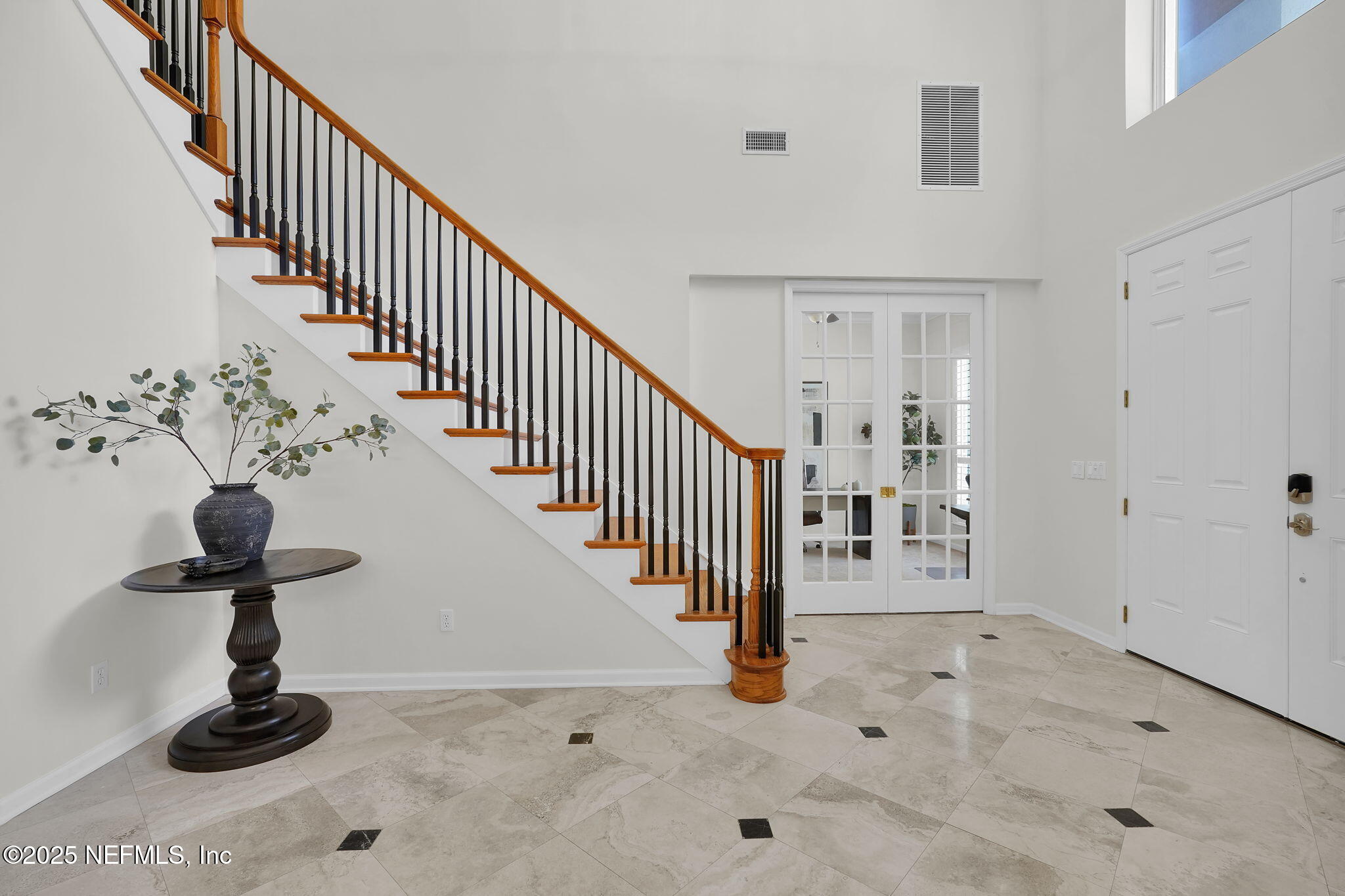 265 Oak Common Avenue St. Augustine, FL 32095 - Photo 24 of 116 a view of entryway with wooden floor