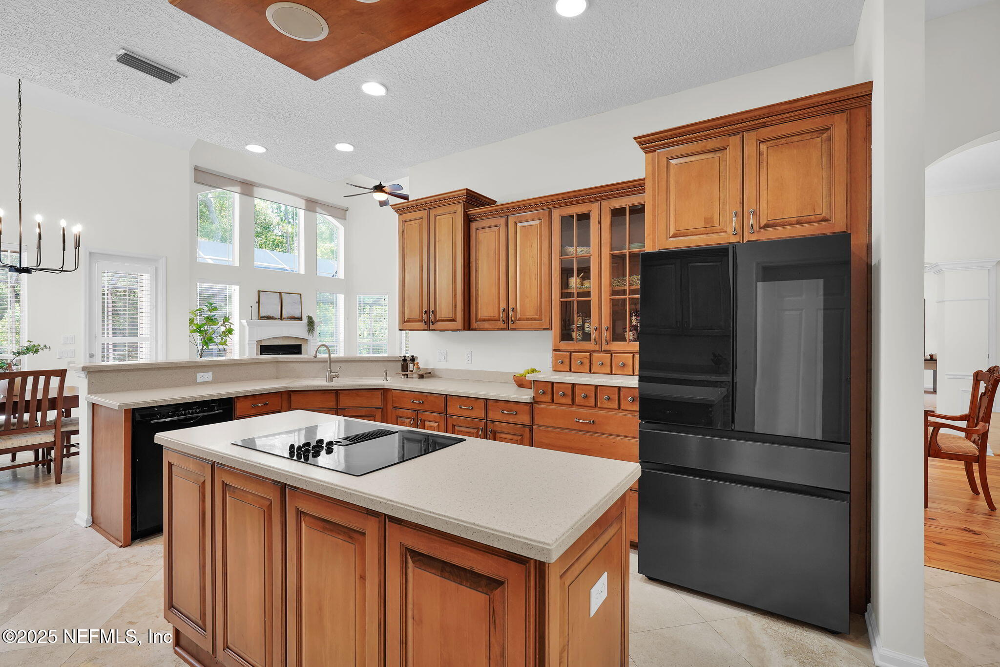 265 Oak Common Avenue St. Augustine, FL 32095 - Photo 7 of 116 a kitchen with stainless steel appliances granite countertop a refrigerator a sink and a stove
