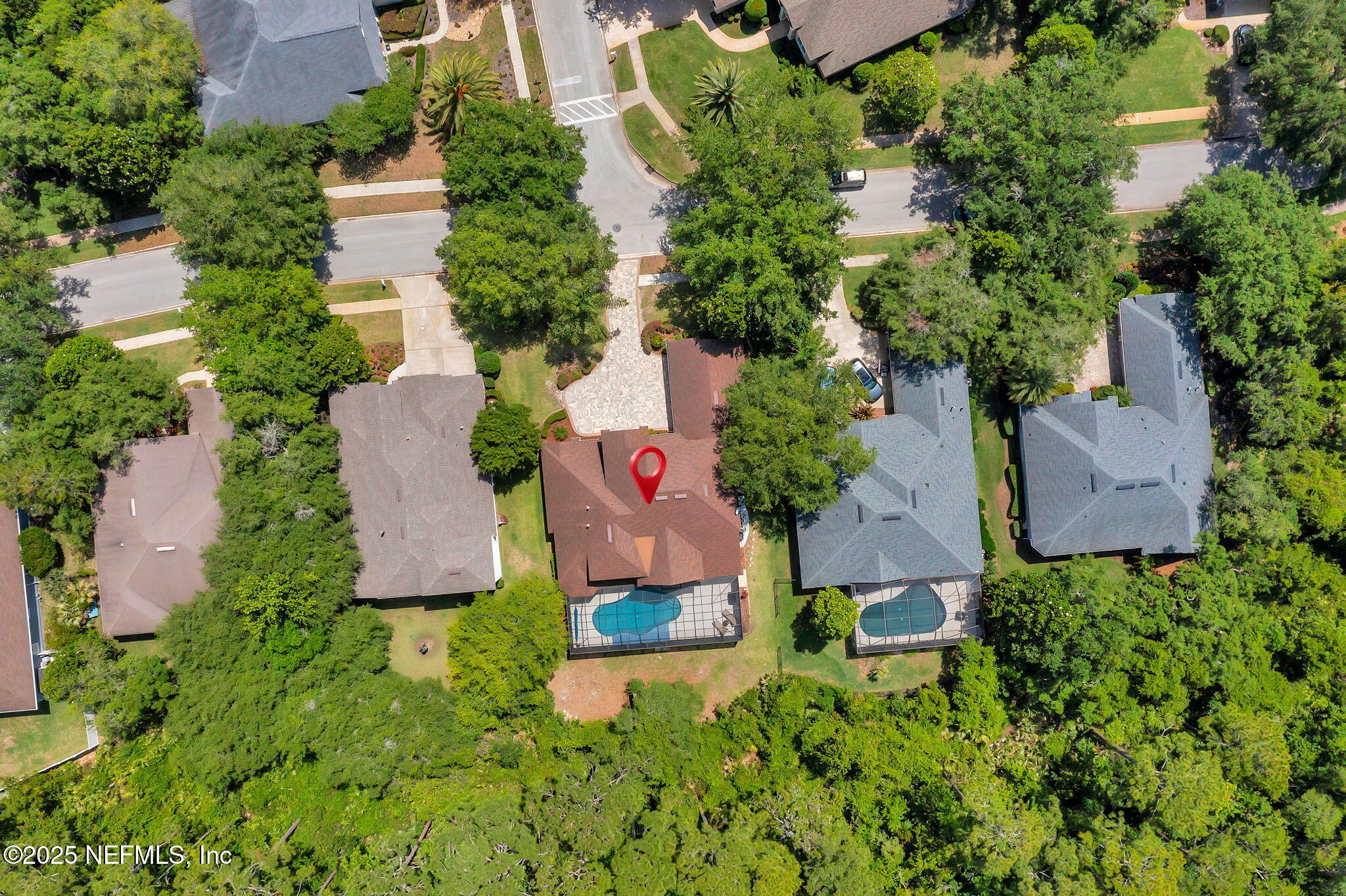 265 Oak Common Avenue St. Augustine, FL 32095 - Photo 75 of 116 an aerial view of a house with a yard and lake view