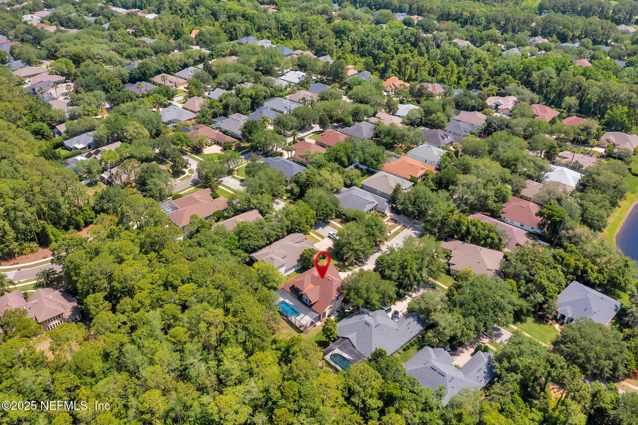265 Oak Common Avenue St. Augustine, FL 32095 - Photo 76 of 116 an aerial view of residential houses with outdoor space and trees