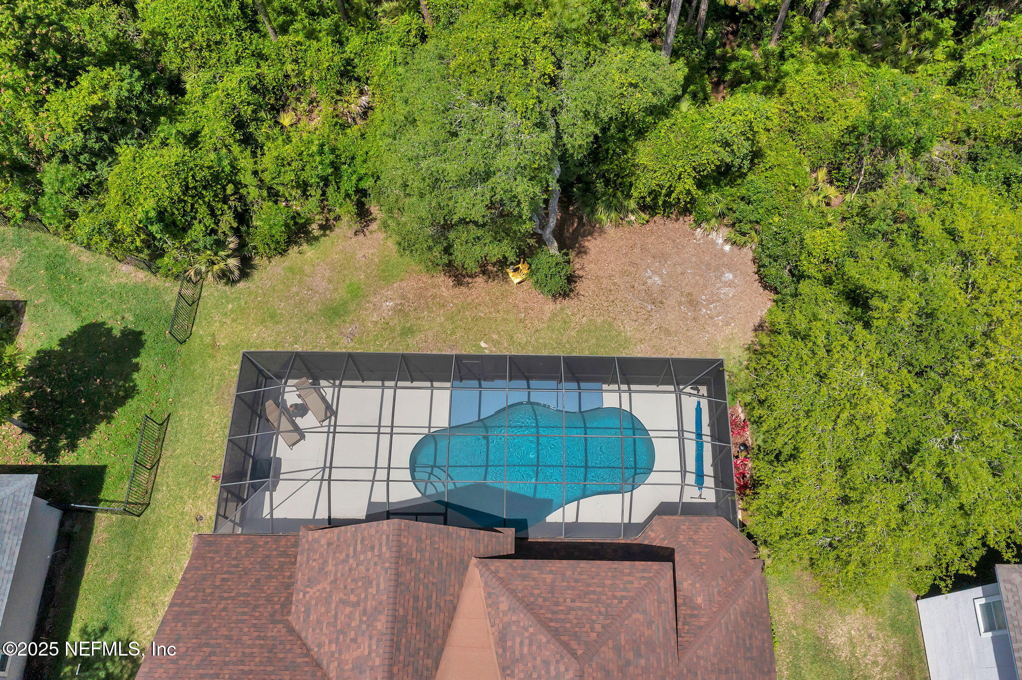 265 Oak Common Avenue St. Augustine, FL 32095 - Photo 80 of 116 an aerial view of a house having yard