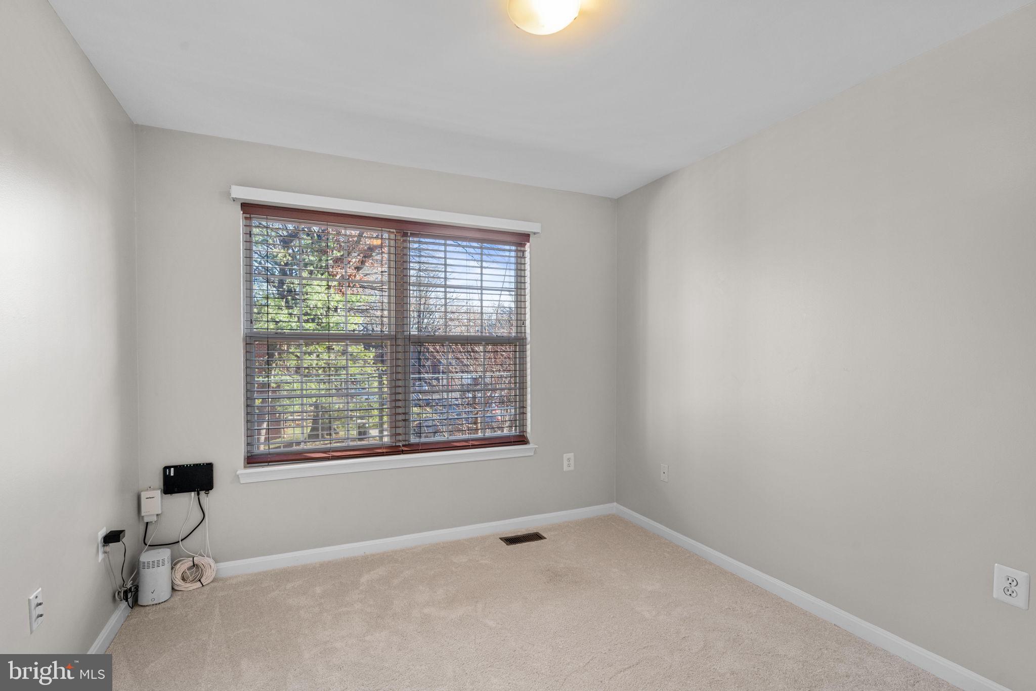 11844 Breton Court, Unit 19A Reston, VA 20191 - Photo 12 of 36 Lots of light. Blinds & window treatments convey