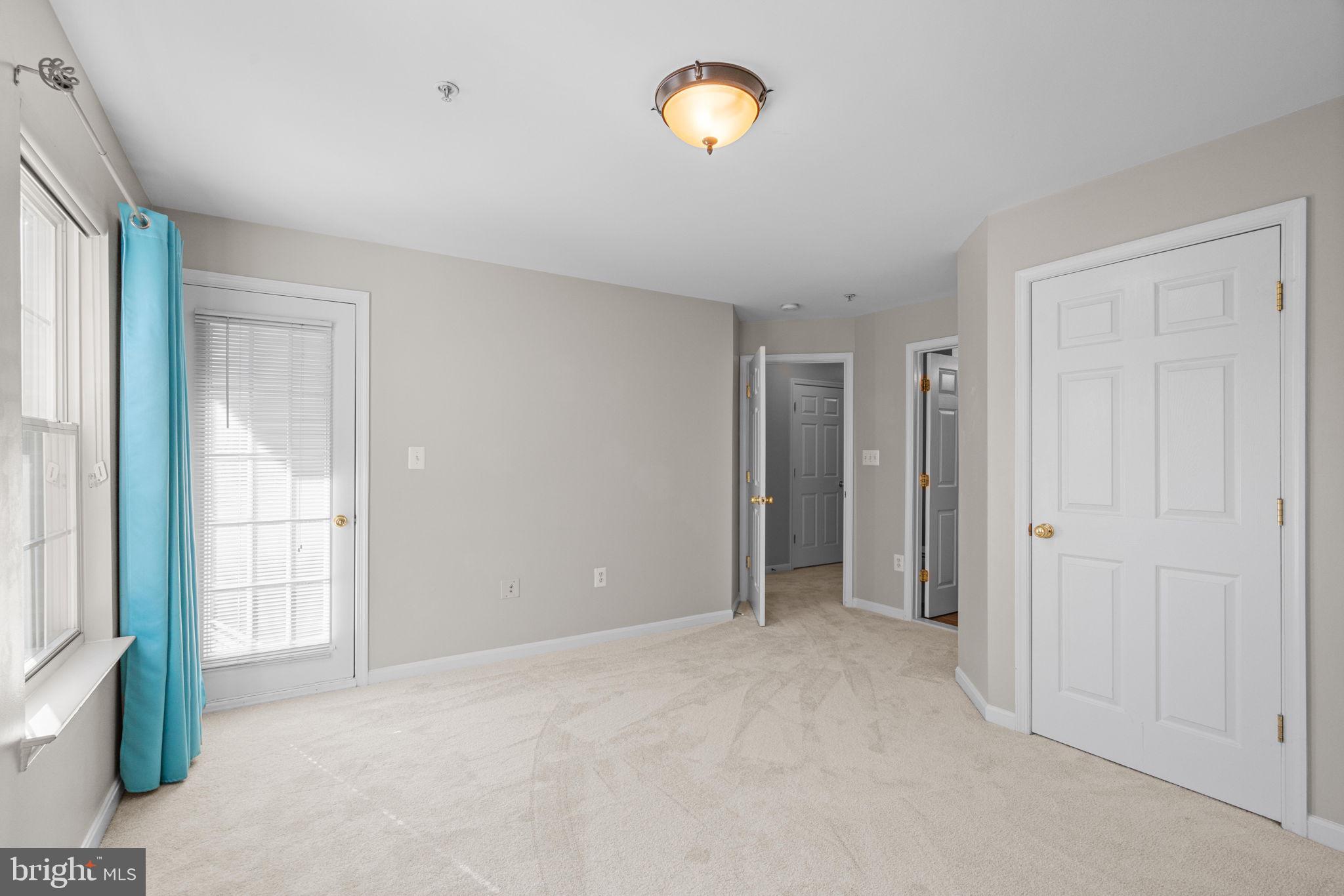 11844 Breton Court, Unit 19A Reston, VA 20191 - Photo 16 of 36 Large closet and ensuite bath