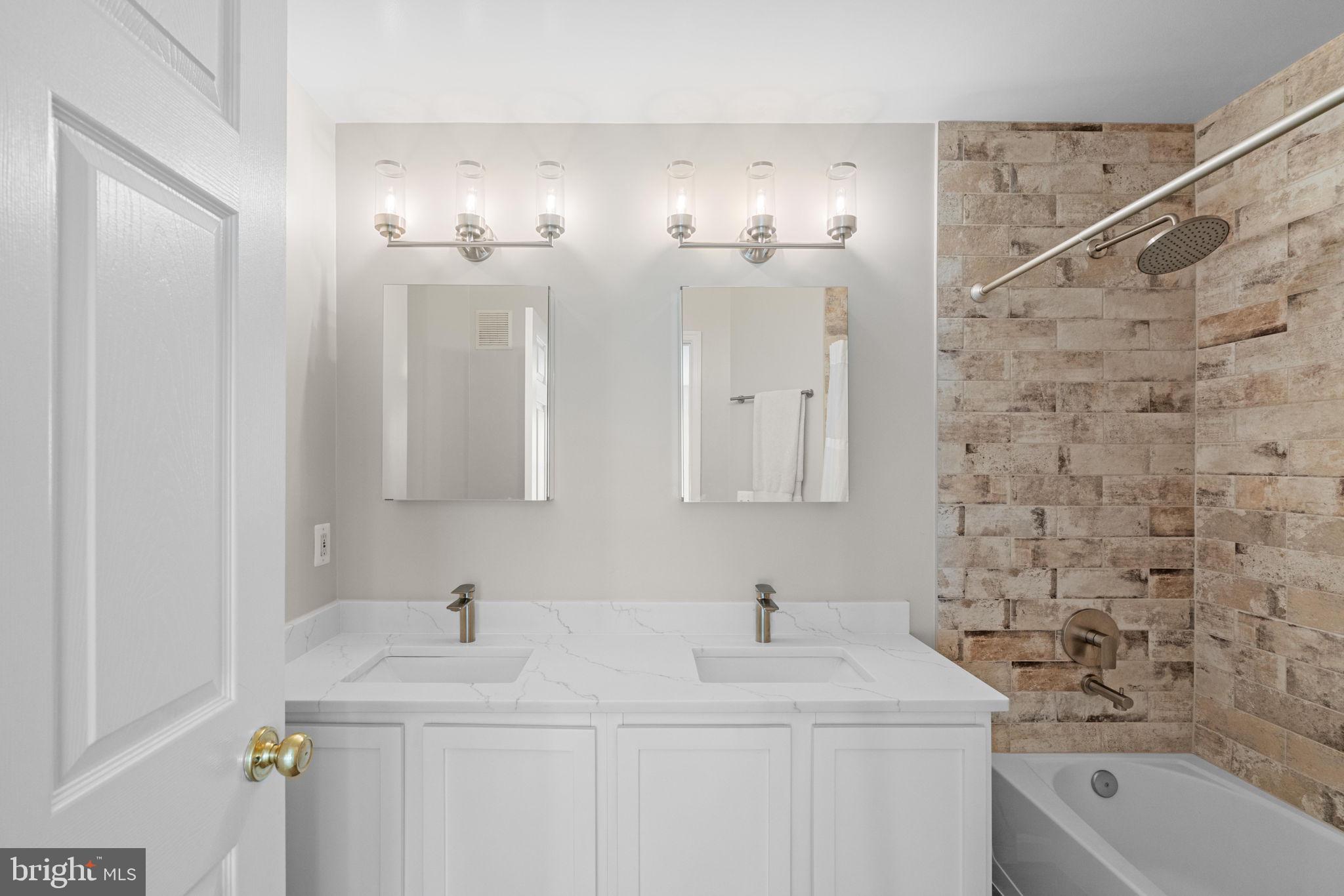 11844 Breton Court, Unit 19A Reston, VA 20191 - Photo 17 of 36 Renovated bath in the primary suite is...