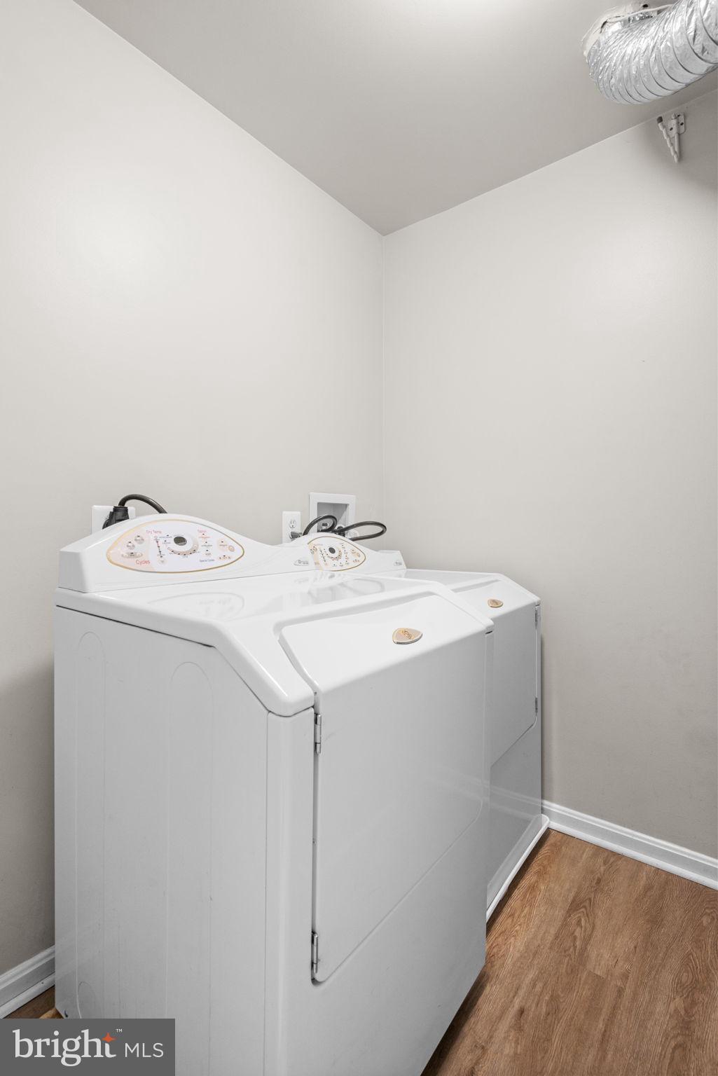 11844 Breton Court, Unit 19A Reston, VA 20191 - Photo 24 of 36 Full washer and dryer on the off the bedrooms
