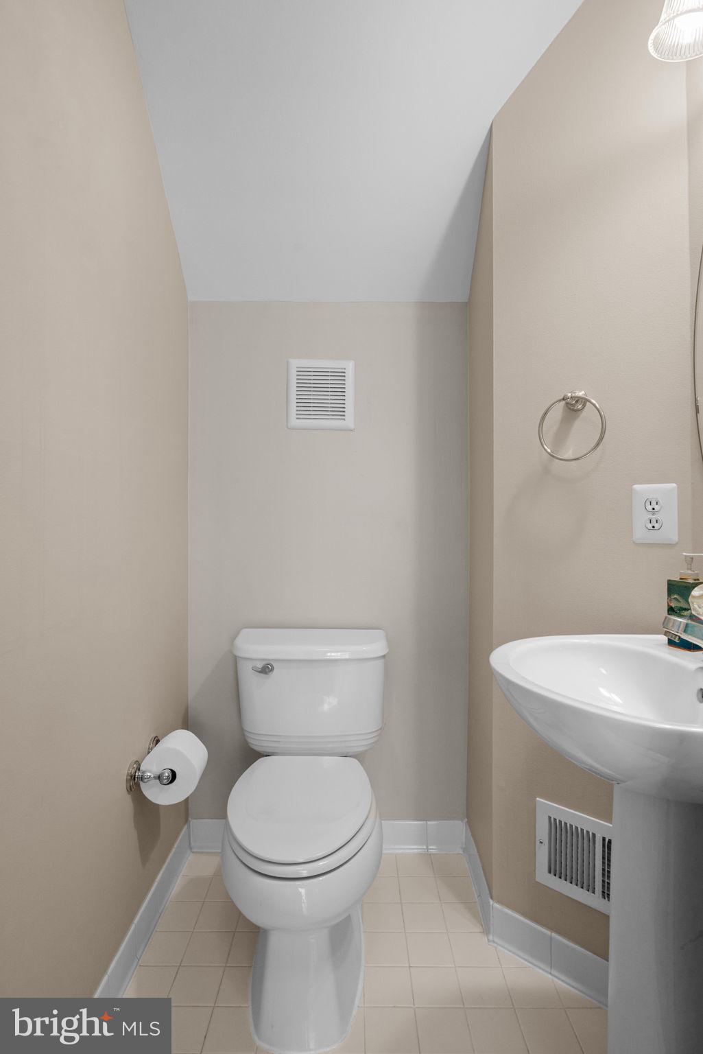 11844 Breton Court, Unit 19A Reston, VA 20191 - Photo 9 of 36 Powder room on main level