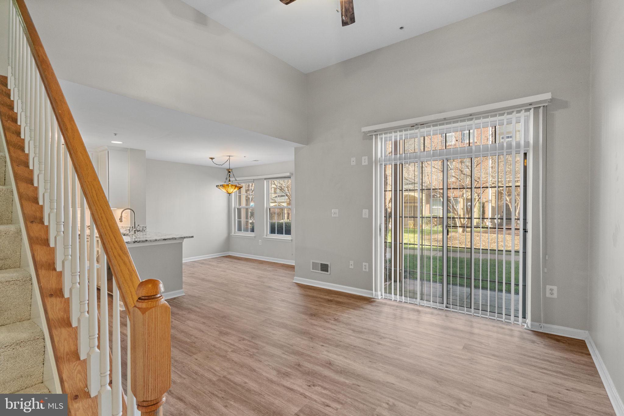 11844 Breton Court, Unit 19A Reston, VA 20191 - Photo 10 of 36 Patio off the living area. Let's go upstairs