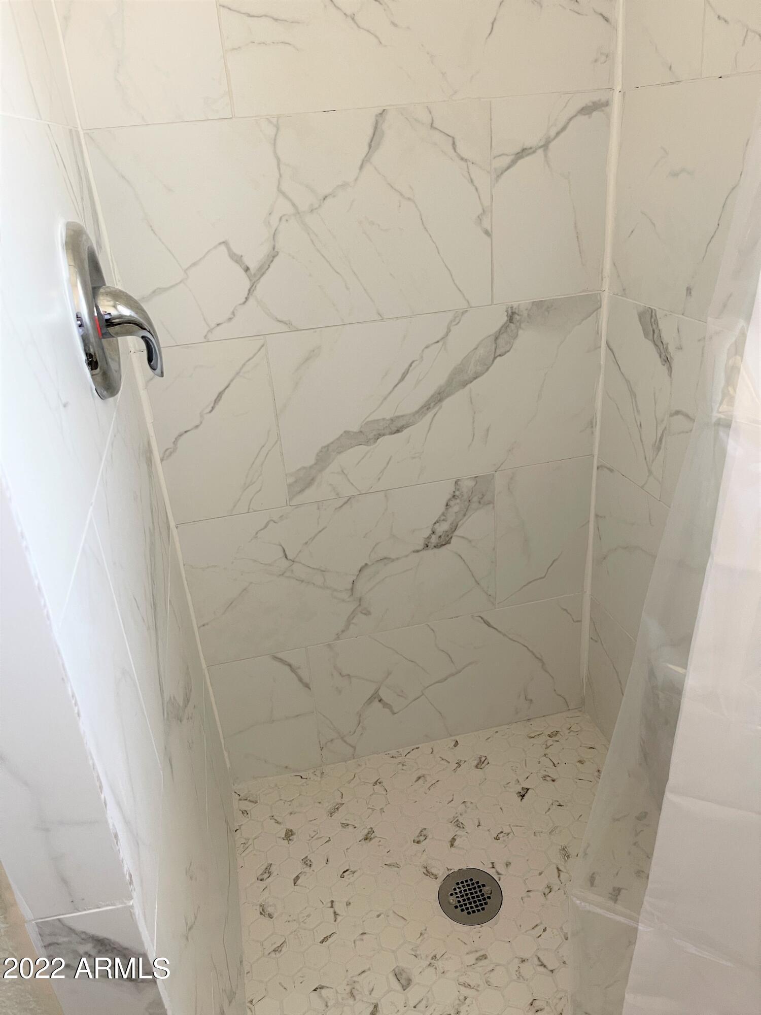 1504 North French Street, Unit B Casa Grande, AZ 85122 - Photo 11 of 23 a bathroom with a shower