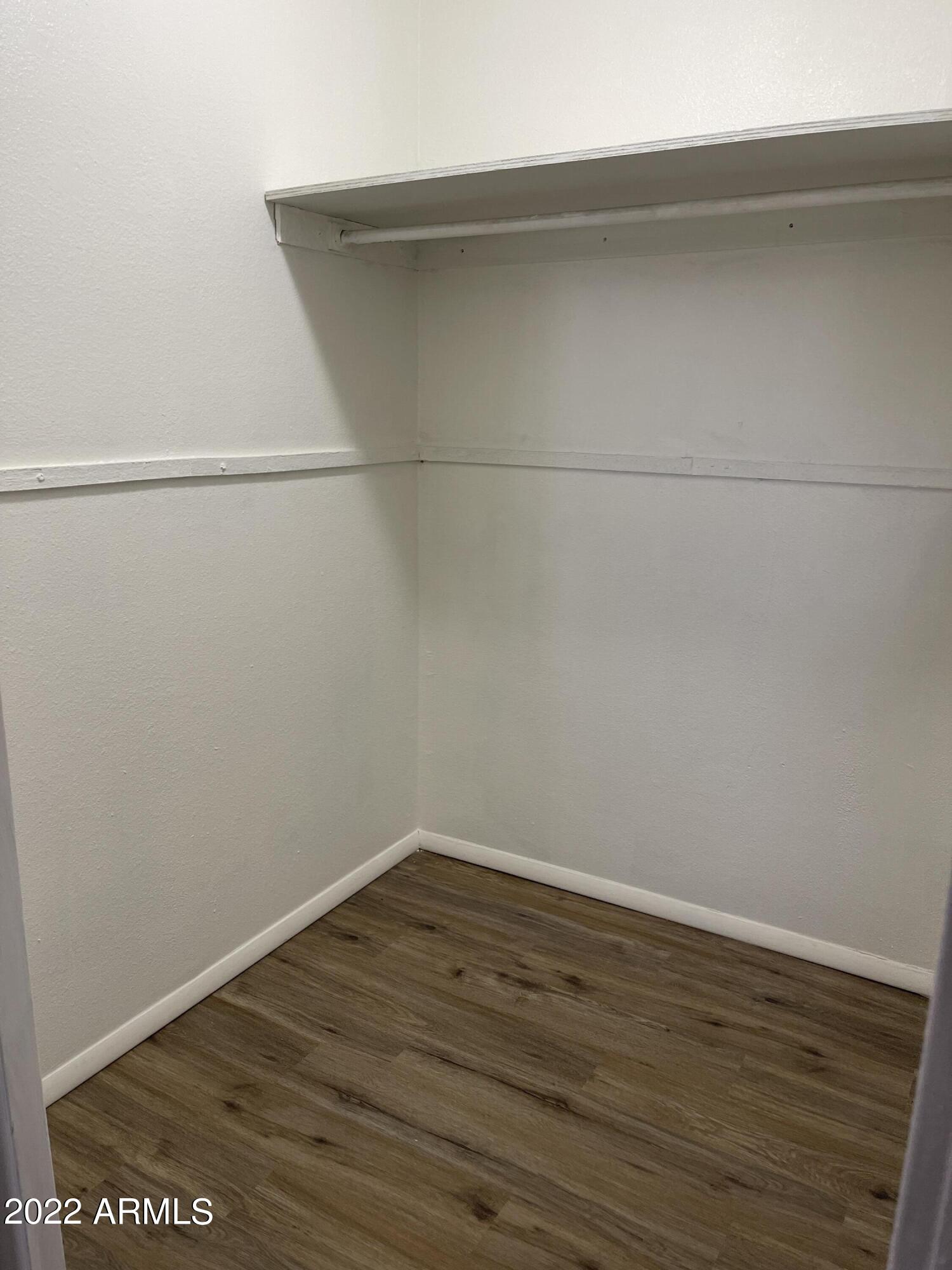 1504 North French Street, Unit B Casa Grande, AZ 85122 - Photo 8 of 23 a view of a room with wooden floor