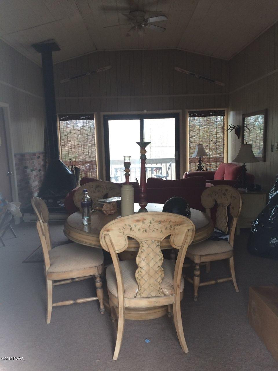 133 Panda Road Dingmans Ferry, PA 18328 - Photo 3 of 11 a view of a dining room with furniture