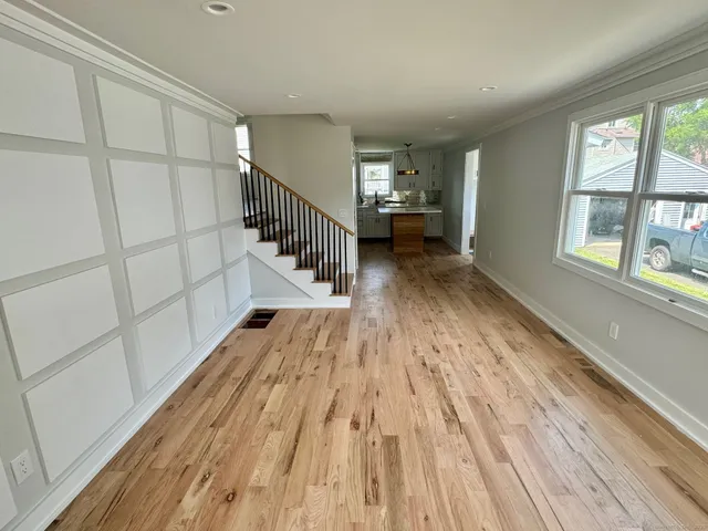 a view of entryway with wooden floor