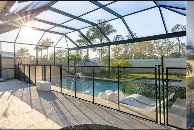 a view of a backyard of the house