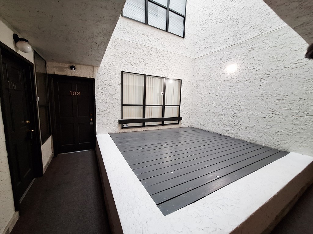 2409 Leon Street, Unit 108 Austin, TX 78705 - Photo 2 of 14 Entry and Atrium. Sitting area