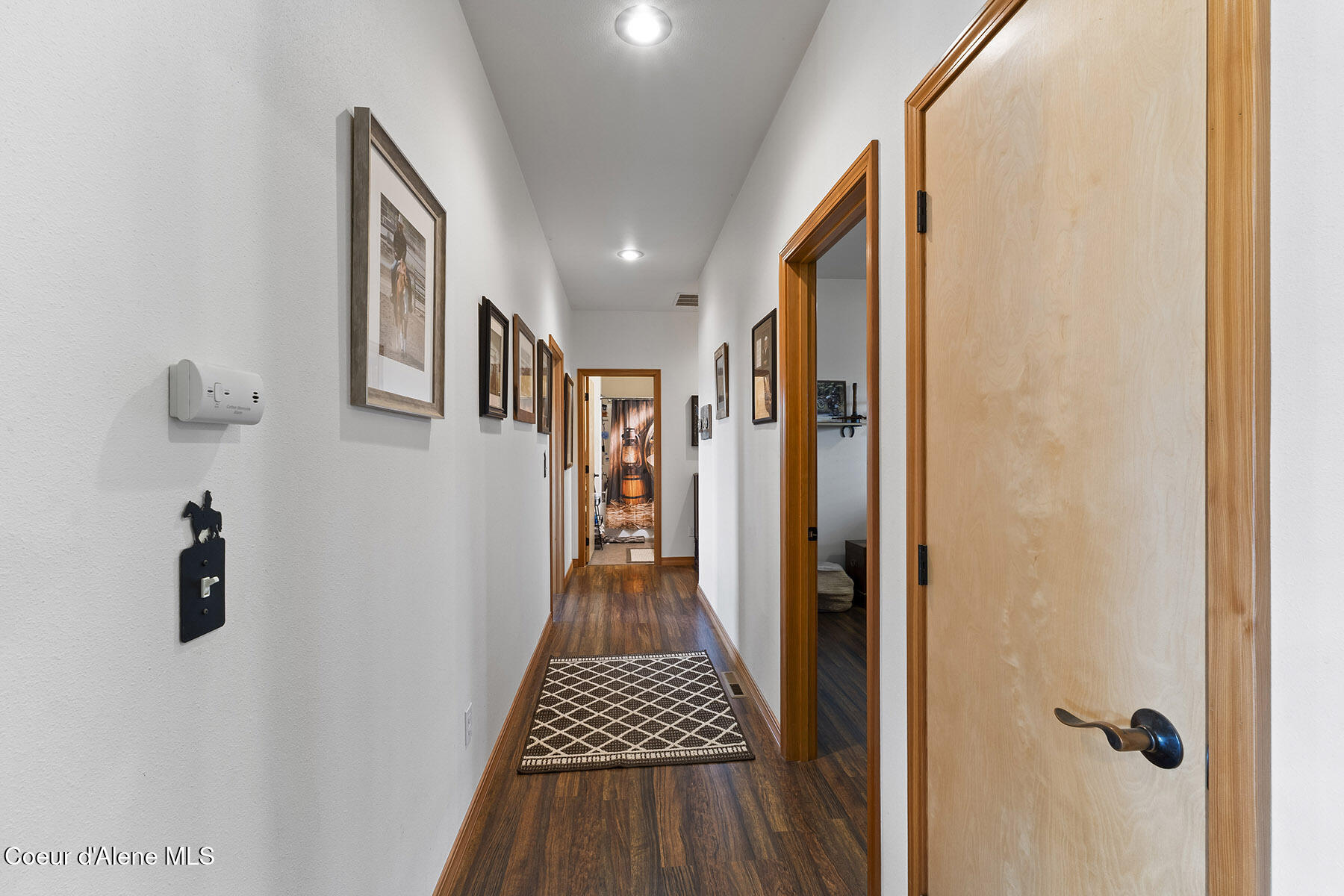 135 Honeysuckle Road Bonners Ferry, ID 83805 - Photo 9 of 28 Hallway to the Bedrooms
