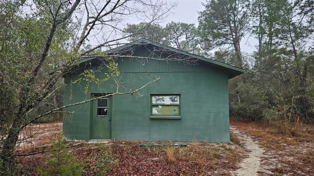 0 Indian Trail Road Weeki Wachee, FL 34613 - Photo 4 of 4 a view of a street