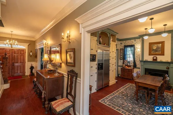 a living room with furniture fireplace and flat screen tv