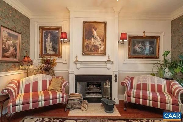 a view of front door with chair and mirror