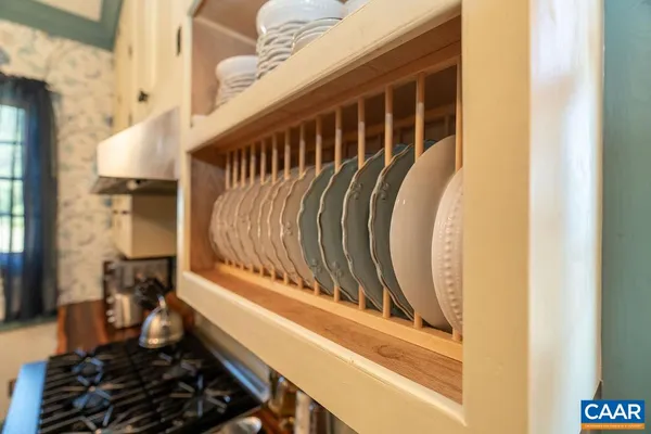 a bedroom with a bed and a table