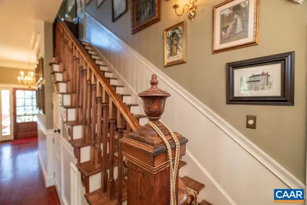a bathroom with a sink a toilet and a window