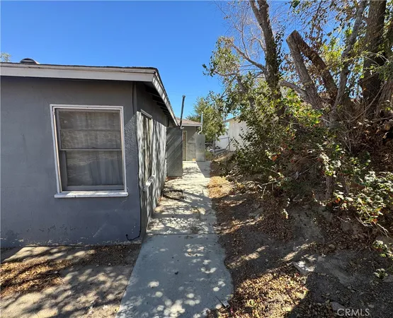 a view of backyard of a house