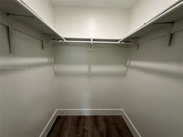 a view of a room with racks on the wall