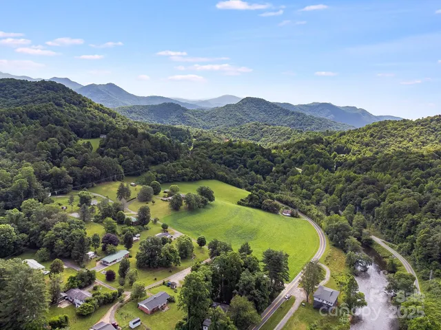 a view of a lake with mountains in the background