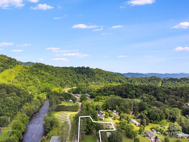 a view of a city with mountains in the background