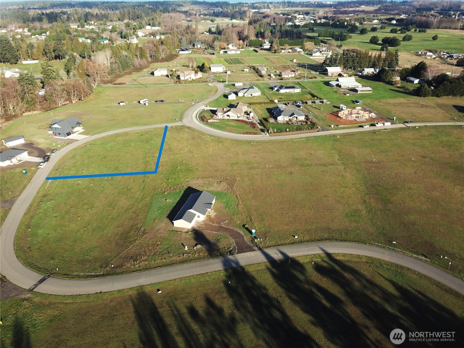 9999 Lange Lane Sequim, WA 98382 - Photo 7 of 16 an aerial view of a house with a swimming pool