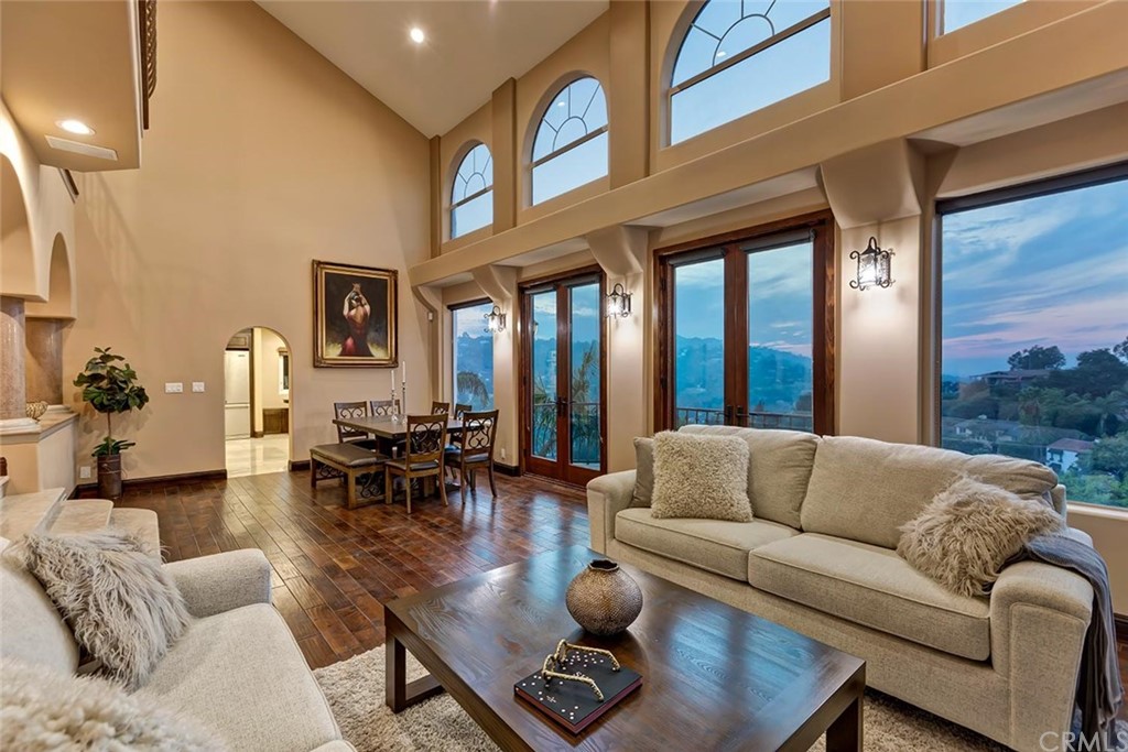 3263 Tareco Drive Los Angeles, CA 90068 - Photo 2 of 71 a living room with furniture and a large window