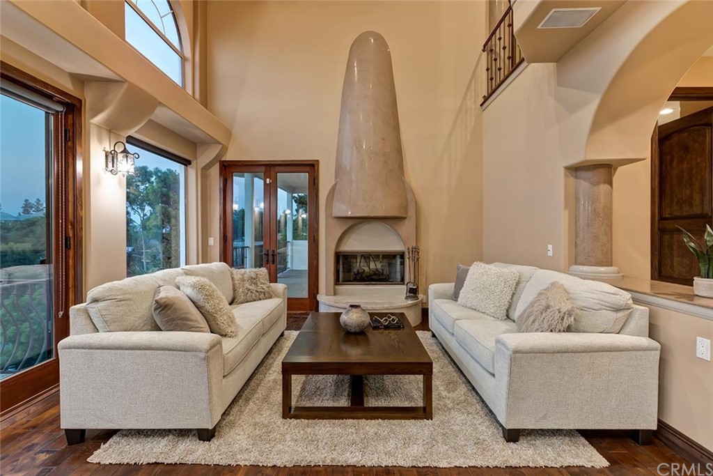 3263 Tareco Drive Los Angeles, CA 90068 - Photo 3 of 71 a living room with furniture fireplace and a large window