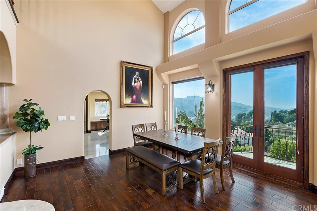 3263 Tareco Drive Los Angeles, CA 90068 - Photo 35 of 71 a view of a livingroom with furniture window and wooden floor
