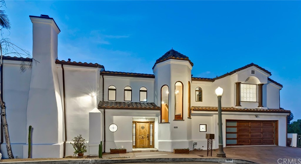 3263 Tareco Drive Los Angeles, CA 90068 - Photo 71 of 71 a front view of a house with many windows