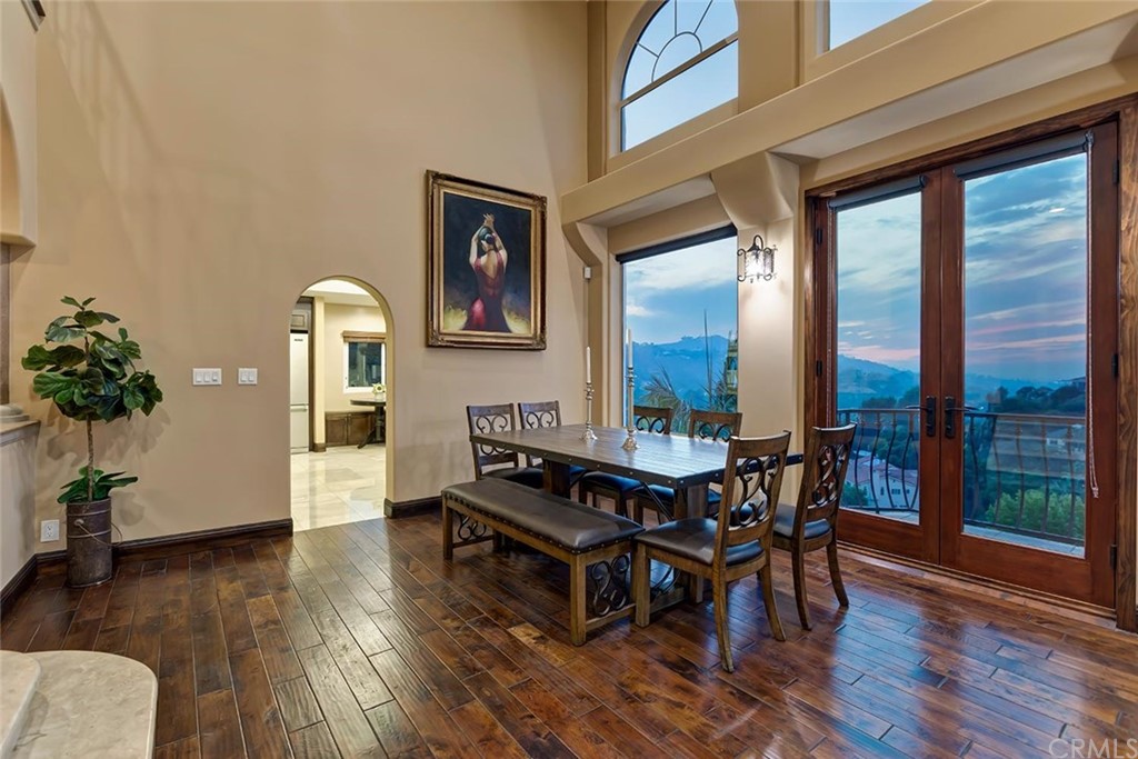 3263 Tareco Drive Los Angeles, CA 90068 - Photo 8 of 71 a dining room with furniture and wooden floor