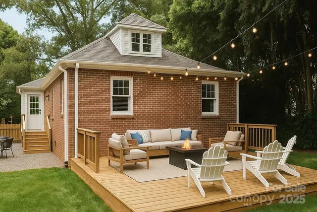 a view of a patio with couches table and chairs and potted plants